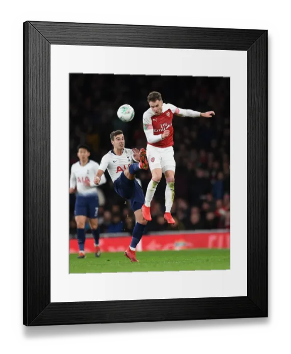 Framed Print : Aaron Ramsey vs. Harry Winks: A Battle in the Carabao Cup Quarterfinal