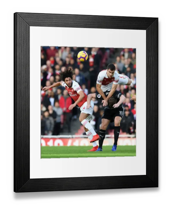 Framed Print : Arsenal's Elneny and Sokratis Battle it Out Against Chris Wood of Burnley Framed Print : Arsenal's Elneny and Sokratis Battle it Out Against Chris Wood of Burnley