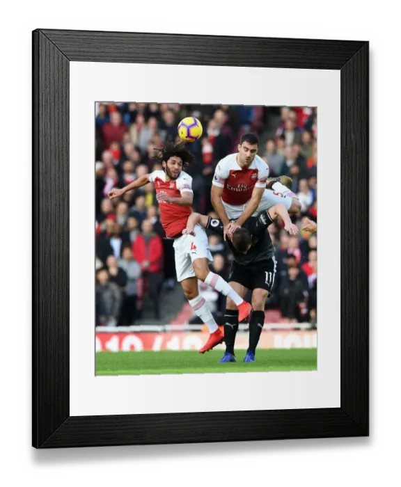 Framed Print : Arsenal vs Burnley: Elneny and Sokratis Battle for Possession against Chris Wood