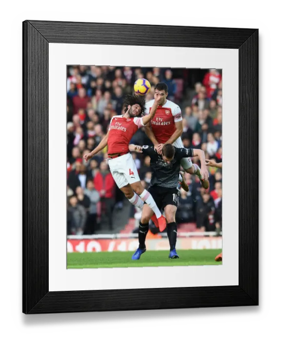 Framed Print : Clash at Emirates: Elneny and Sokratis Go Head-to-Head Against Wood