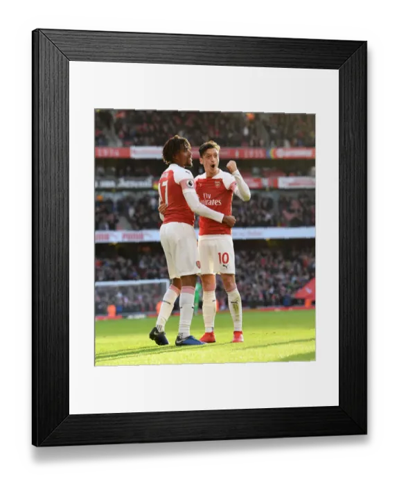 Framed Print : Triumphant Moment: Iwobi and Ozil's Unforgettable Goal Celebration (Arsenal vs Burnley, 2018-19)