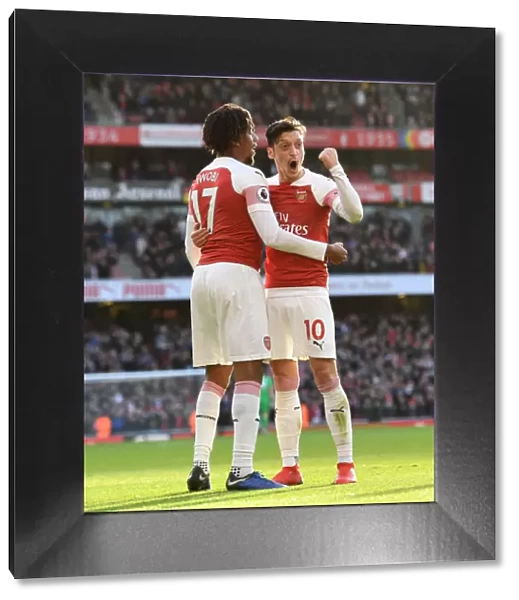 Triumphant Moment: Iwobi and Ozil's Euphoric Goal Celebration (Arsenal vs Burnley, 2018-19)
