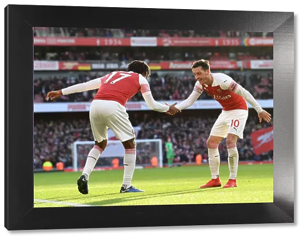 Arsenal's Iwobi and Ozil Celebrate Goal Against Burnley, 2018-19 Premier League