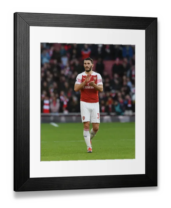 Framed Print : Arsenal's Sead Kolasinac Celebrates with Fans after Victory over Burnley Framed Print : Arsenal's Sead Kolasinac Celebrates with Fans after Victory over Burnley
