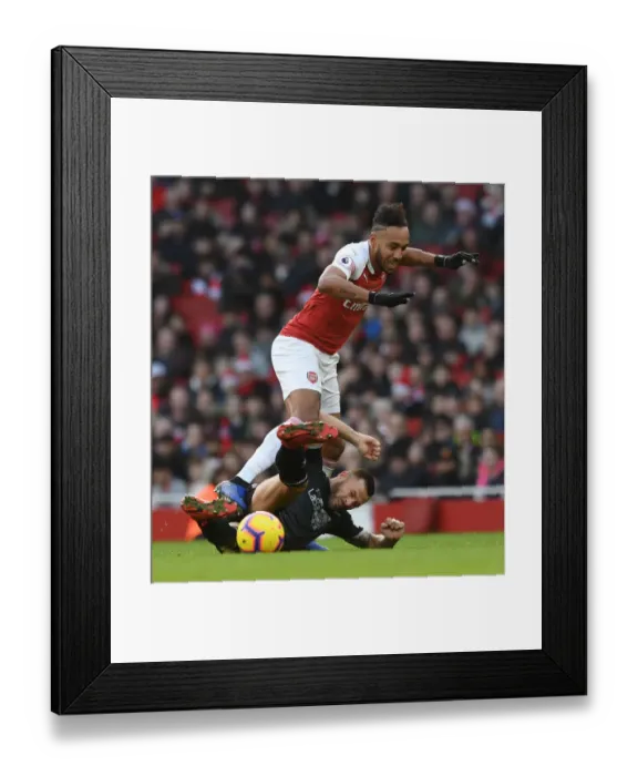Framed Print : Arsenal's Aubameyang Faces Off Against Burnley's Bardsley in Premier League Clash Framed Print : Arsenal's Aubameyang Faces Off Against Burnley's Bardsley in Premier League Clash