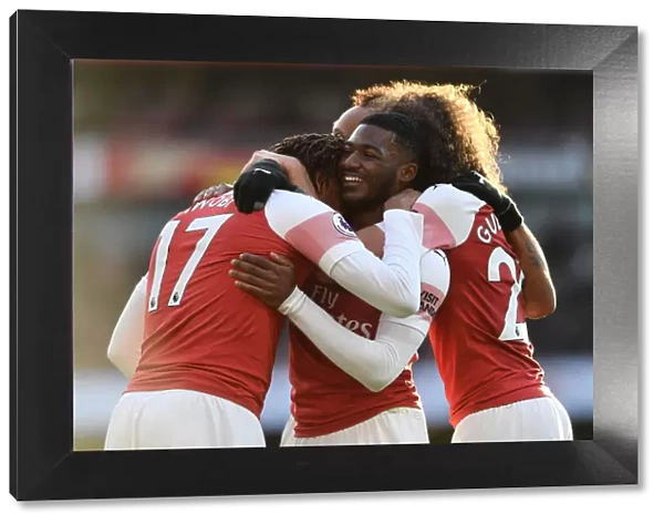 Celebrating Victory: Iwobi and Maitland-Niles Rejoice After Arsenal's Third Goal vs Burnley (2018-19)