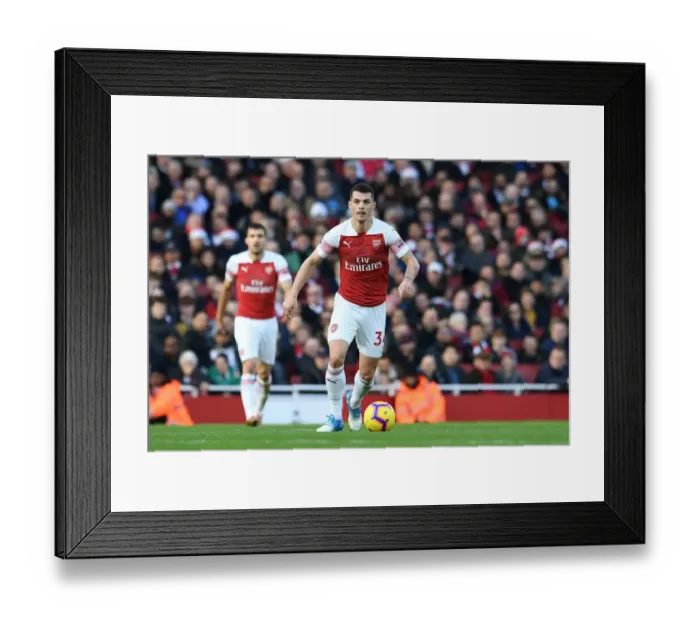 Framed Print : Granit Xhaka: Arsenal Midfielder in Action Against Burnley (Premier League 2018-19) Framed Print : Granit Xhaka: Arsenal Midfielder in Action Against Burnley (Premier League 2018-19)