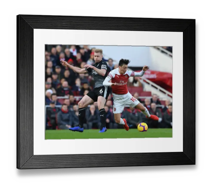 Framed Print : Mesut Ozil vs Ben Mee: Intense Battle at Arsenal's Emirates Stadium (Arsenal v Burnley 2018-19) Framed Print : Mesut Ozil vs Ben Mee: Intense Battle at Arsenal's Emirates Stadium (Arsenal v Burnley 2018-19)
