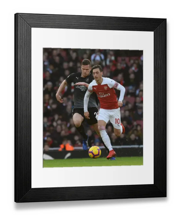 Framed Print : Mesut Ozil vs. Kevin Long: Arsenal FC vs. Burnley FC, Premier League Showdown Framed Print : Mesut Ozil vs. Kevin Long: Arsenal FC vs. Burnley FC, Premier League Showdown