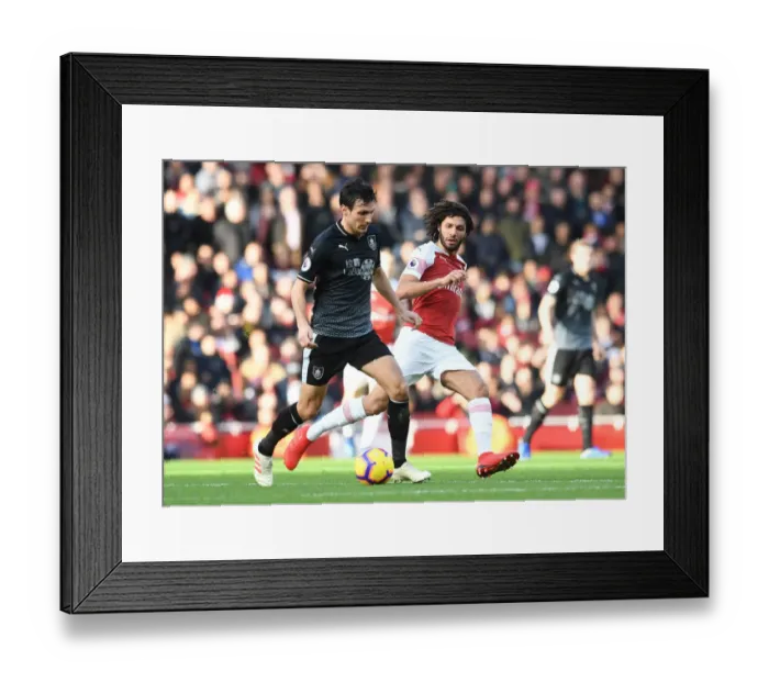 Framed Print : Arsenal's Mohamed Elneny Closes Down Jack Cork in Intense Arsenal v Burnley Premier League Clash Framed Print : Arsenal's Mohamed Elneny Closes Down Jack Cork in Intense Arsenal v Burnley Premier League Clash