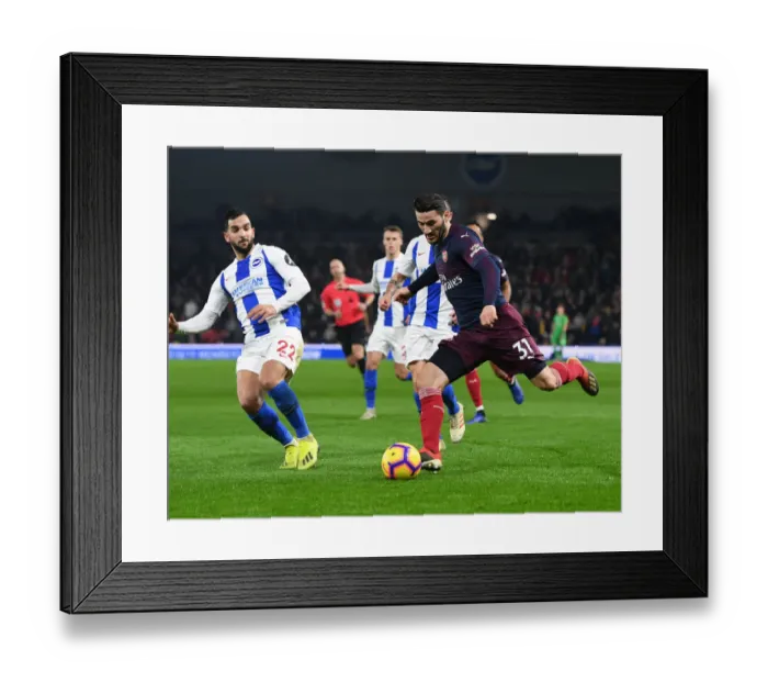 Framed Print : Arsenal's Sead Kolasinac Clashes with Brighton's Martin Montoya in Premier League Showdown