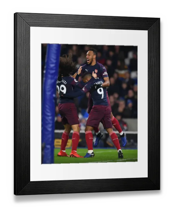 Framed Print : Arsenal's Aubameyang, Lacazette, and Guendouzi Celebrate Goal Against Brighton (2018-19)