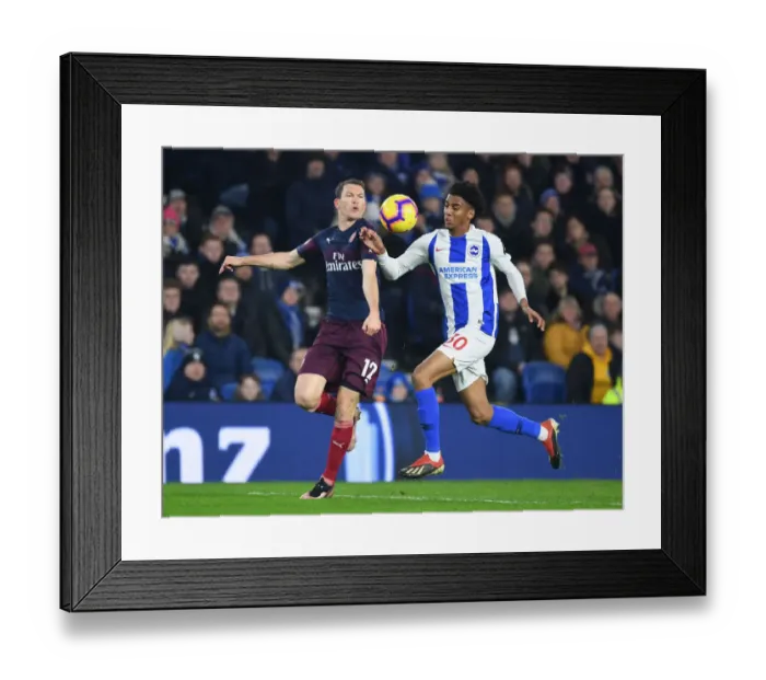 Framed Print : Arsenal's Lichtsteiner Outmaneuvers Brighton's Bernardo in Premier League Clash