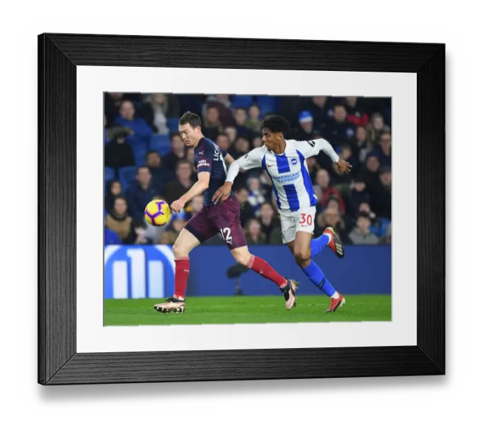 Framed Print : Arsenal's Lichtsteiner Battles Past Brighton's Bernardo in Premier League Clash