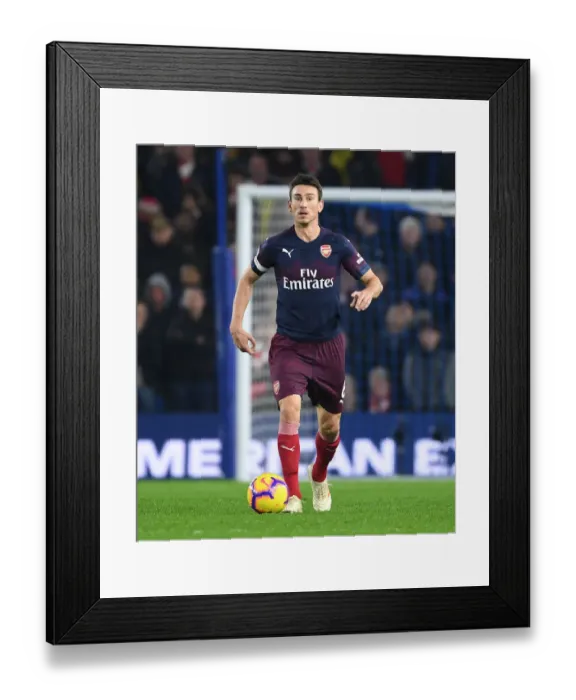 Framed Print : Laurent Koscielny Focuses Amidst Brighton vs Arsenal Premier League Clash Framed Print : Laurent Koscielny Focuses Amidst Brighton vs Arsenal Premier League Clash
