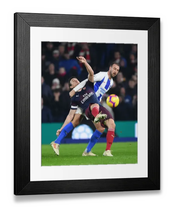 Framed Print : Laurent Koscielny vs Glenn Murray: Intense Battle in Brighton & Hove Albion vs Arsenal FC Premier League Clash