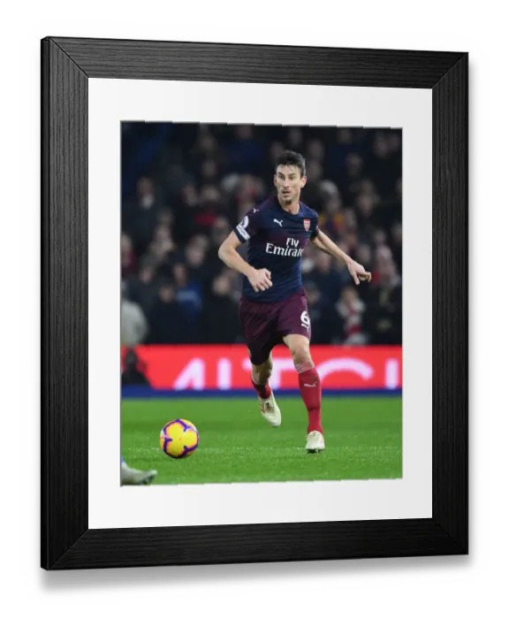 Framed Print : Focused Koscielny: Arsenal's Unyielding Defender vs. Brighton (December 2018)