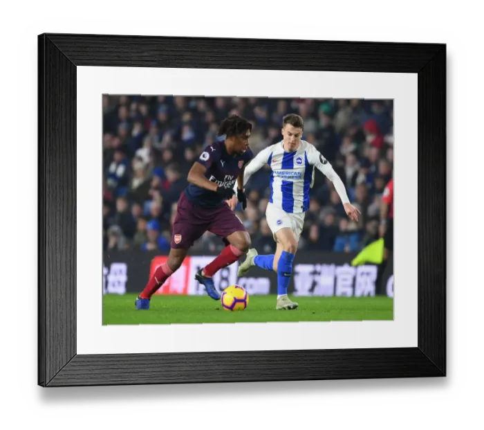 Framed Print : Arsenal's Alex Iwobi Outmaneuvers Brighton's Solly March in Premier League Clash Framed Print : Arsenal's Alex Iwobi Outmaneuvers Brighton's Solly March in Premier League Clash