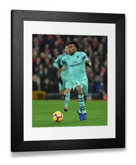 Framed Print : Arsenal's Alex Iwobi Faces Off Against Liverpool in Premier League Clash Framed Print : Arsenal's Alex Iwobi Faces Off Against Liverpool in Premier League Clash