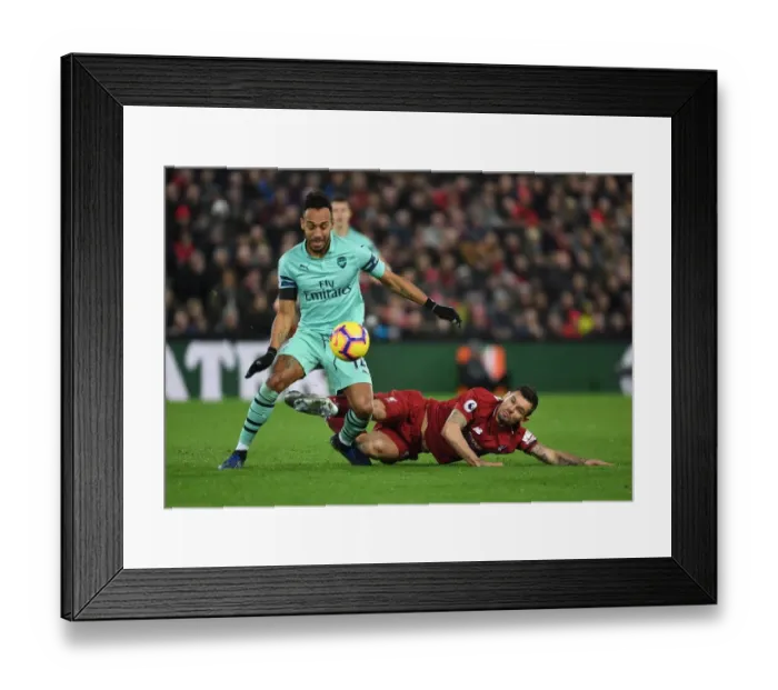 Framed Print : Aubameyang vs. Lovren: A Premier League Rivalry Ignites at Anfield Framed Print : Aubameyang vs. Lovren: A Premier League Rivalry Ignites at Anfield