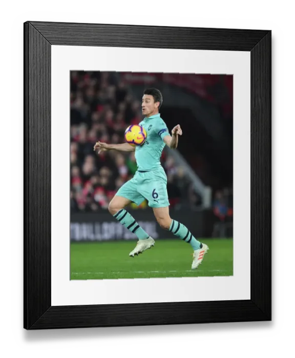 Framed Print : Arsenal's Laurent Koscielny at Liverpool's Anfield during the 2018-19 Premier League Match Framed Print : Arsenal's Laurent Koscielny at Liverpool's Anfield during the 2018-19 Premier League Match