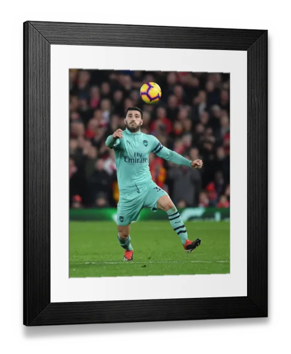 Framed Print : Arsenal's Sead Kolasinac Goes Head-to-Head with Liverpool in Intense Premier League Showdown