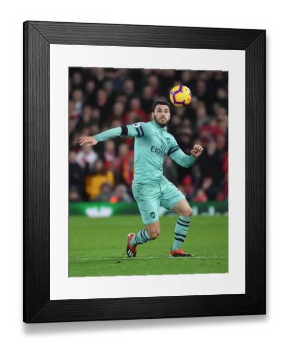 Framed Print : Arsenal's Sead Kolasinac Faces Off Against Liverpool in Premier League Clash