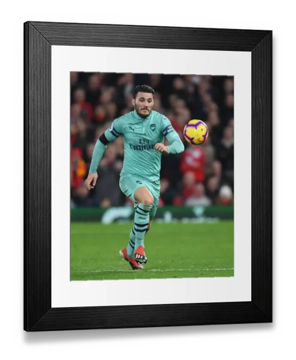 Framed Print : Intense Showdown: Sead Kolasinac vs. Liverpool in Premier League Clash