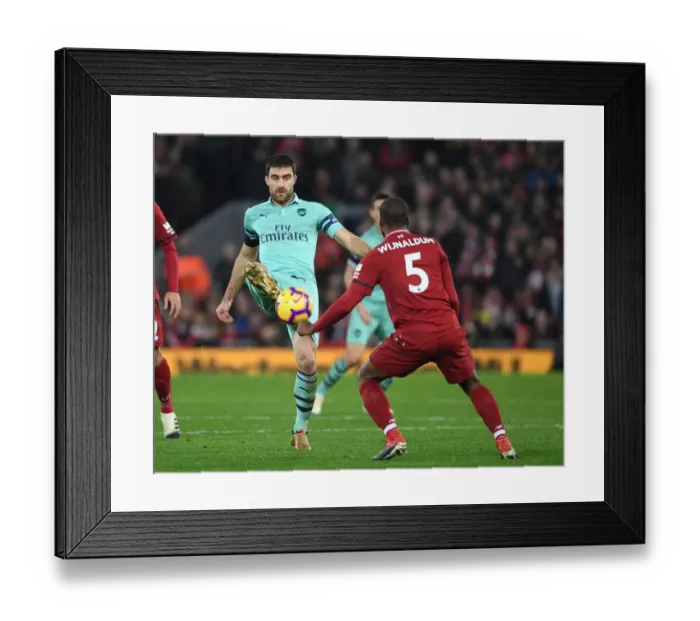Framed Print : Sokratis vs. Wijnaldum: Intense Battle at Anfield - Liverpool vs. Arsenal, Premier League 2018-19