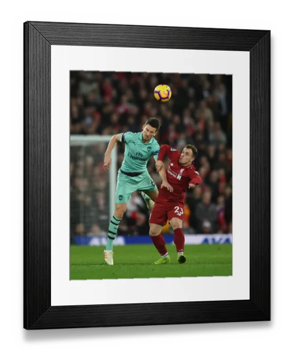 Framed Print : Clash at Anfield: Koscielny vs. Shaqiri - Liverpool vs. Arsenal, Premier League 2018-19