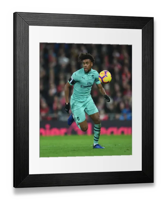 Framed Print : LIVERPOOL, ENGLAND - DECEMBER 29: Alex Iwobi of Arsenal during the Premier League match between Liverpool FC
