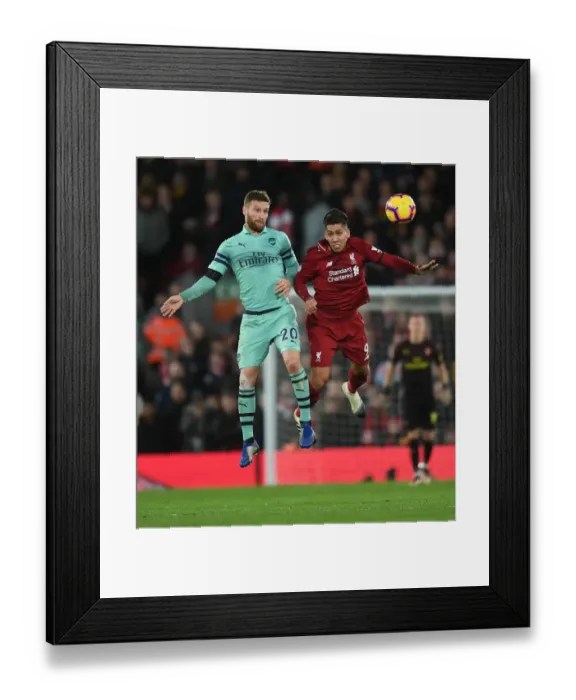 Framed Print : Mustafi vs. Firmino: Heading Clash in the Premier League Battle between Liverpool and Arsenal Framed Print : Mustafi vs. Firmino: Heading Clash in the Premier League Battle between Liverpool and Arsenal