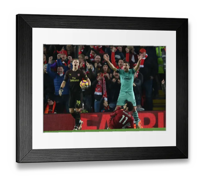 Framed Print : Controversial Penalty Call: Sokratis and Leno Protest as Mo Salah Scores for Liverpool Against Arsenal