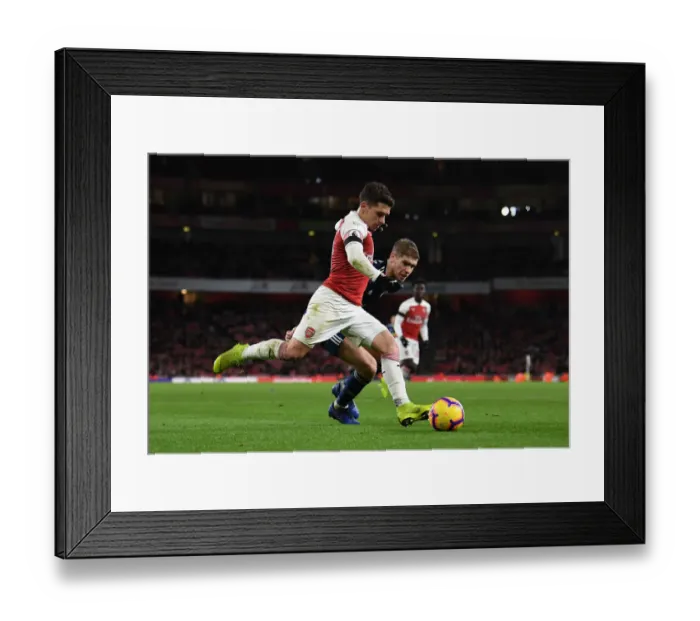 Framed Print : Arsenal's Torreira Clashes with Fulham's Le Marchand in Premier League Showdown