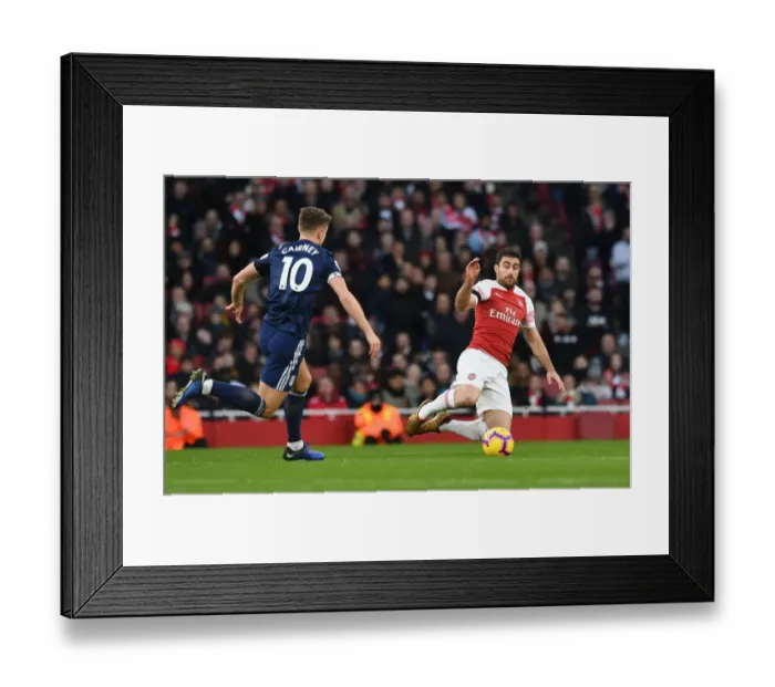 Framed Print : Arsenal's Sokratis Fends Off Fulham's Tom Cairney: Premier League Clash at Emirates Stadium Framed Print : Arsenal's Sokratis Fends Off Fulham's Tom Cairney: Premier League Clash at Emirates Stadium
