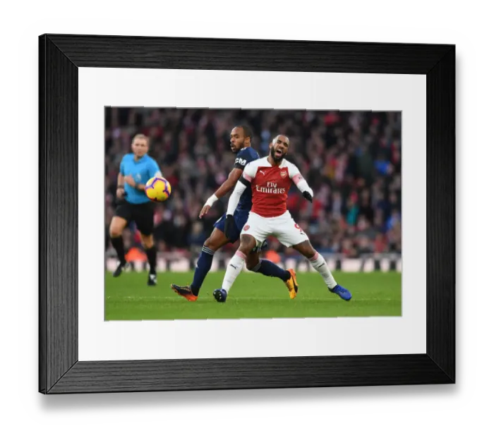 Framed Print : Arsenal's Lacazette Fouls by Fulham's Odoi in Premier League Clash