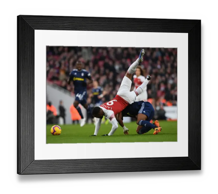 Framed Print : Intense Clash: Lacazette Fouls by Odoi in Arsenal vs. Fulham