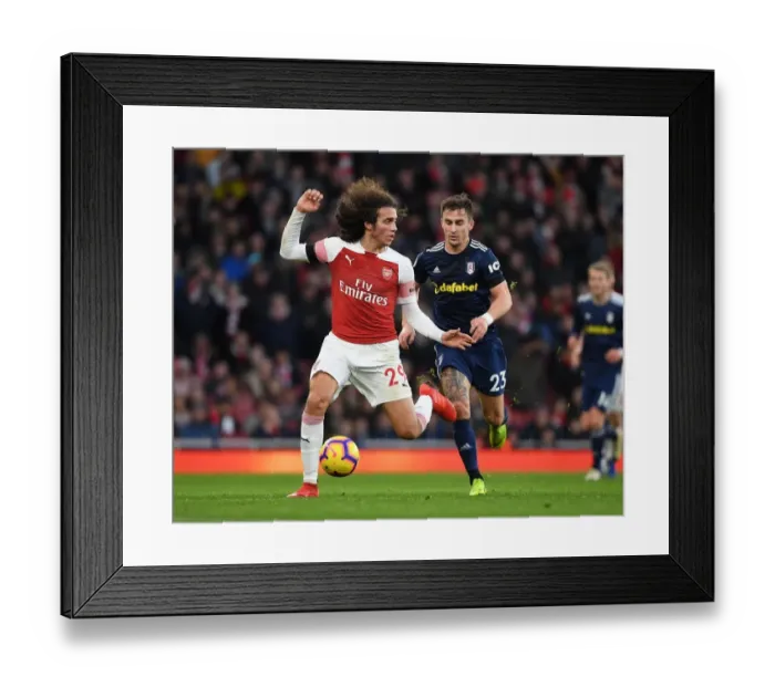 Framed Print : Guendouzi vs. Bryan: Intense Clash in Arsenal's Premier League Battle against Fulham (January 2019)