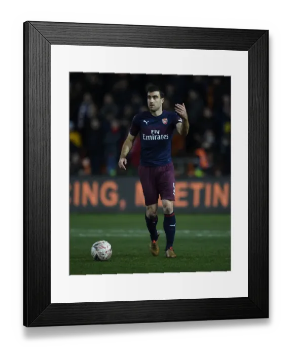 Framed Print : Arsenal's Sokratis in FA Cup Action against Blackpool at Bloomfield Road Framed Print : Arsenal's Sokratis in FA Cup Action against Blackpool at Bloomfield Road