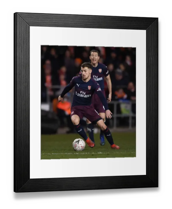 Framed Print : Arsenal's Aaron Ramsey Shines in FA Cup Clash against Blackpool