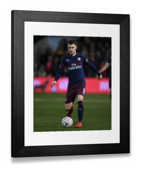 Framed Print : Arsenal's Aaron Ramsey Shines: Overpowering Blackpool in FA Cup Third Round Framed Print : Arsenal's Aaron Ramsey Shines: Overpowering Blackpool in FA Cup Third Round