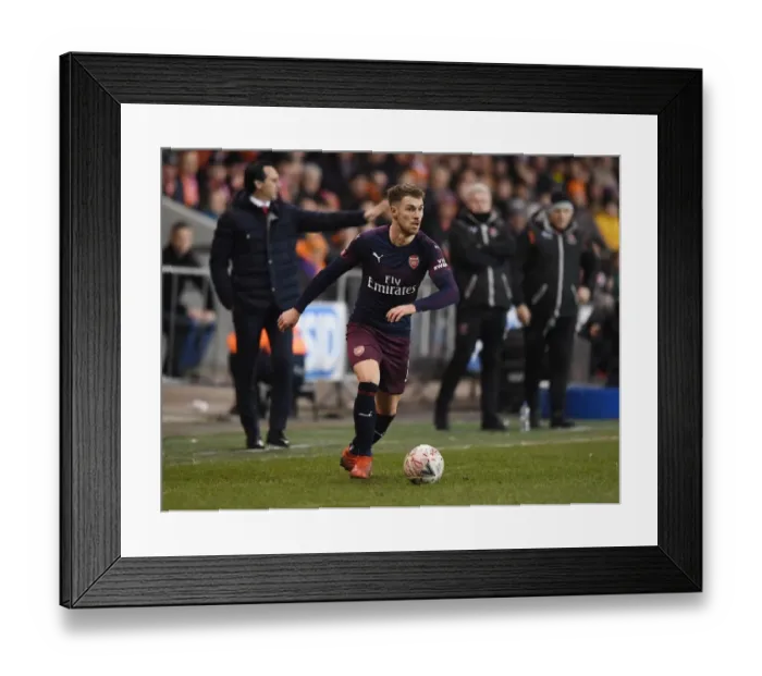 Framed Print : Arsenal's Aaron Ramsey in FA Cup Action against Blackpool (2019) Framed Print : Arsenal's Aaron Ramsey in FA Cup Action against Blackpool (2019)