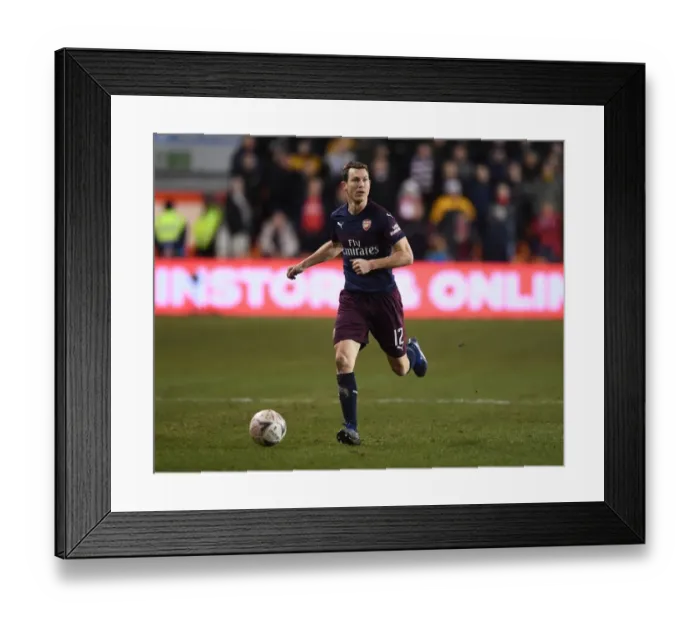 Framed Print : Arsenal's Stephan Lichtsteiner in FA Cup Action against Blackpool Framed Print : Arsenal's Stephan Lichtsteiner in FA Cup Action against Blackpool