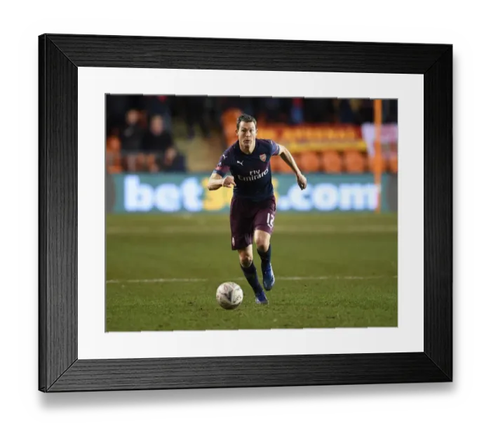 Framed Print : Arsenal's Stephan Lichtsteiner in FA Cup Action Against Blackpool Framed Print : Arsenal's Stephan Lichtsteiner in FA Cup Action Against Blackpool