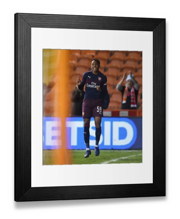 Framed Print : Joe Willock Scores First: Arsenal Triumphs in FA Cup Third Round at Blackpool