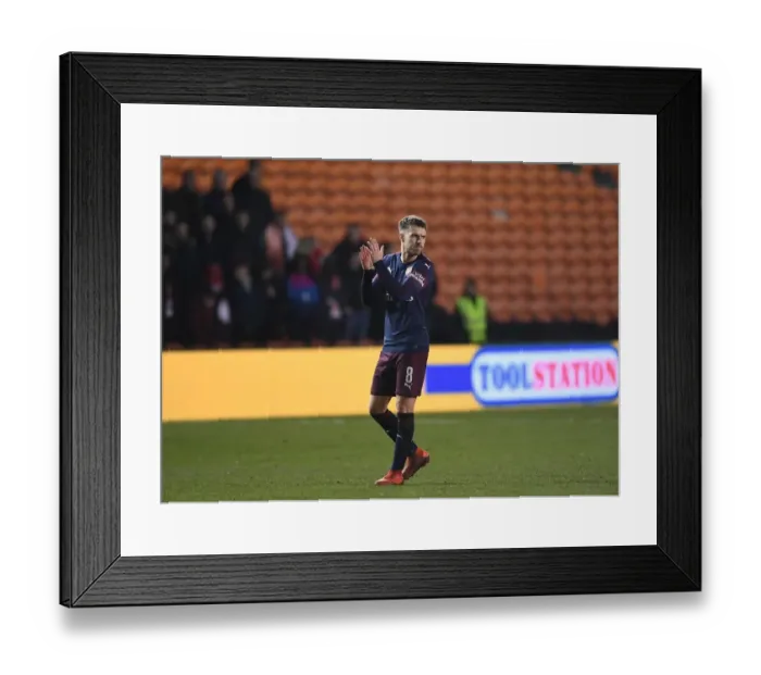 Framed Print : Arsenal's Aaron Ramsey Applauding Fans in FA Cup Third Round Match vs Blackpool Framed Print : Arsenal's Aaron Ramsey Applauding Fans in FA Cup Third Round Match vs Blackpool