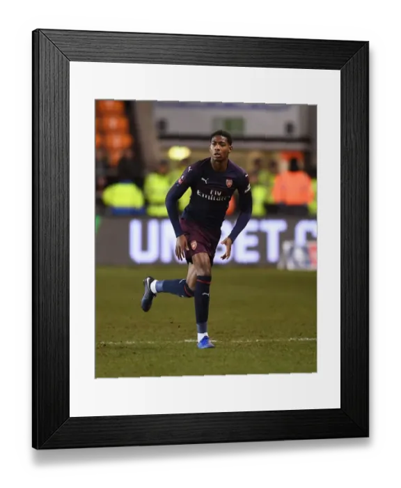Framed Print : Arsenal's Zech Medley in Action during FA Cup Clash against Blackpool Framed Print : Arsenal's Zech Medley in Action during FA Cup Clash against Blackpool