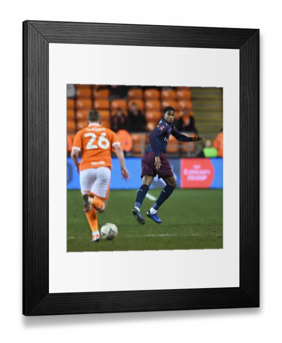 Framed Print : Blackpool vs Arsenal: FA Cup Third Round Clash - Zech Medley Marks Steven Davies