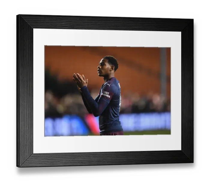 Framed Print : Blackpool vs Arsenal: Zech Medley Honors Arsenal Fans in FA Cup Third Round