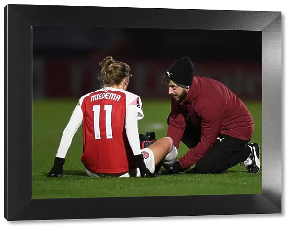 Arsenal Women: Vivianne Miedema Receives Treatment from Physio Sam Blanchard during FA WSL Continental Tyres Cup Match